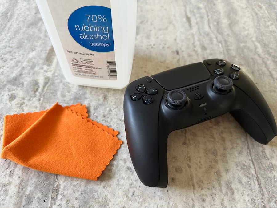 how to clean ps5 controller dualsense edge isopropyl alcohol lint free cloth fix stick drift gizbuyer guide
